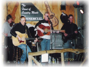 Photo of Bill DeVries on stage at the Commercial Tavern